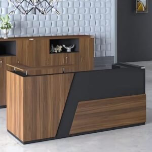 Modern geometric reception desk in a two-tone wood and black finish.